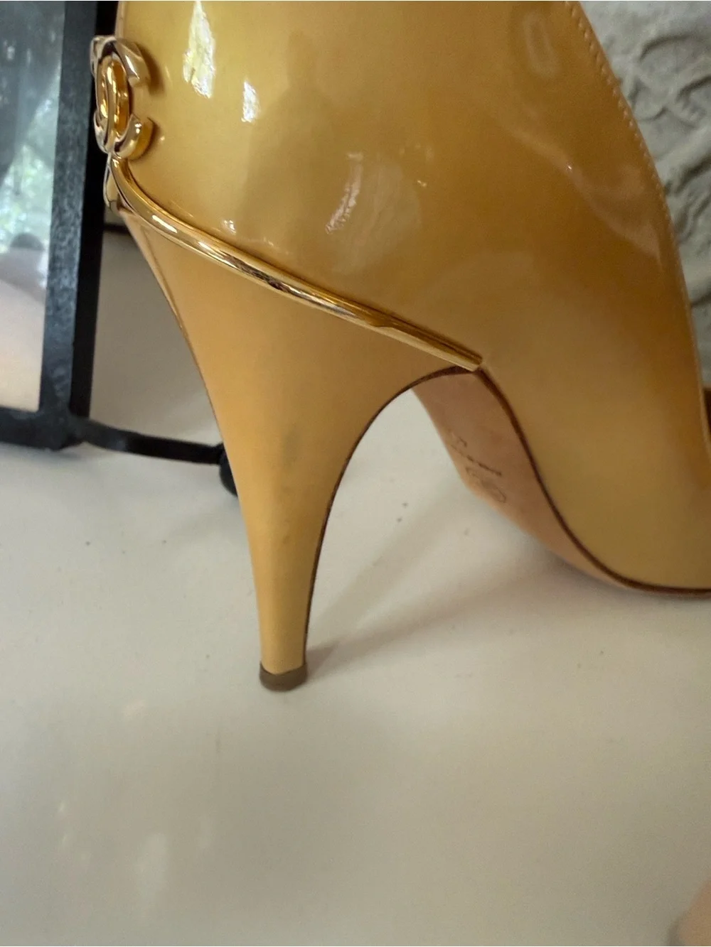 Chanel cream gold patent leather pumps